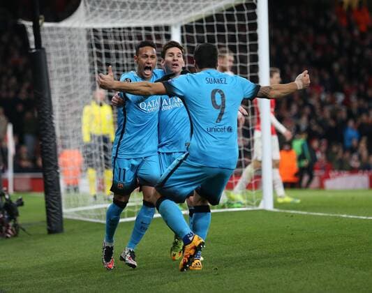 Barcelona s Lionel Messi celebrates scoring his sides opening goal with Neymar UEFA Champions League 2nd Round First Leg - Arsenal vs Barcelona - Emirates Stadium -England - 23rd February 2016 - Picture David Klein Sportimage EDITORIAL USE ONLY. No use with unauthorised audio, video, data, fixture lists, club league logos or live services. Online in-match use limited to 120 images, no video emulation. No use in betting, games or single club league player publications.
