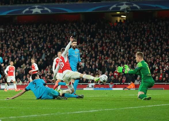 23.02.2016. Emirates Stadium, London, England. UEFA Champions League. Arsenal versus Barcelona. Barcelona Goalkeeper Marc-Andr& xe9; ter Stegen saves a close range shot from Arsenal Midfielder Aaron Ramsey xMarkxKertonx  ActionPlus11710438