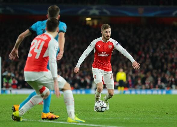 23.02.2016. Emirates Stadium, London, England. UEFA Champions League. Arsenal versus Barcelona. Arsenal Midfielder Aaron Ramsey looks to cross into the Barcelona area xMarkxKertonx  ActionPlus11710459