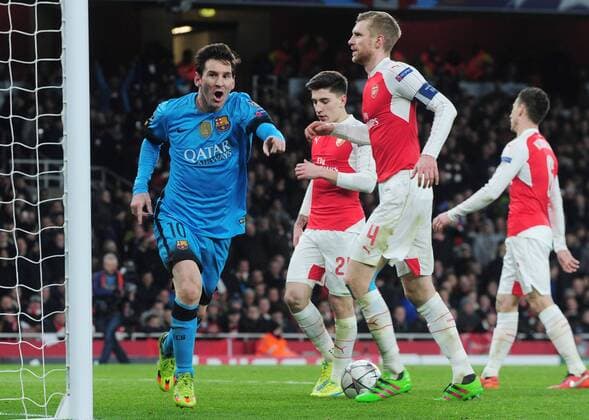 Football - 2015 2016 Champions League - Round of 16, First Leg: Arsenal vs. Barcelona Lionel Messi of Barcelona celebrates scoring goal no 1 at The Emirates. COLORSPORT ANDREW COWIE 