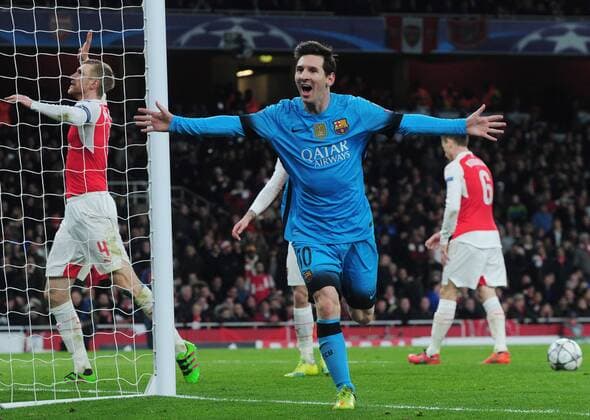 Football - 2015 2016 Champions League - Round of 16, First Leg: Arsenal vs. Barcelona Lionel Messi of Barcelona celebrates scoring goal no 1 at The Emirates. COLORSPORT ANDREW COWIE 