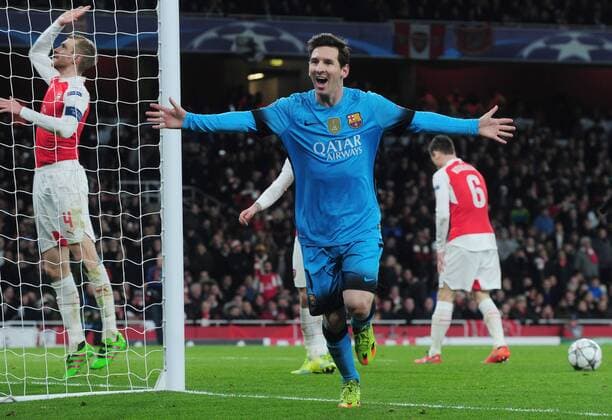Football - 2015 2016 Champions League - Round of 16, First Leg: Arsenal vs. Barcelona Lionel Messi of Barcelona celebrates scoring goal no 1 at The Emirates. COLORSPORT ANDREW COWIE 