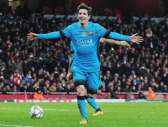 Football - 2015 2016 Champions League - Round of 16, First Leg: Arsenal vs. Barcelona Lionel Messi of Barcelona celebrates scoring goal no 2 from the penalty spot at The Emirates. COLORSPORT ANDREW COWIE 