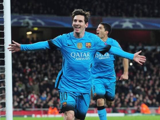 Football - 2015 2016 Champions League - Round of 16, First Leg: Arsenal vs. Barcelona Lionel Messi of Barcelona celebrates scoring goal no 2 from the penalty spot at The Emirates. COLORSPORT ANDREW COWIE 