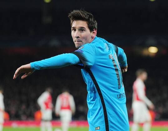 Football - 2015 2016 Champions League - Round of 16, First Leg: Arsenal vs. Barcelona Lionel Messi of Barcelona celebrates scoring goal no 2 from the penalty spot at The Emirates. COLORSPORT ANDREW COWIE 
