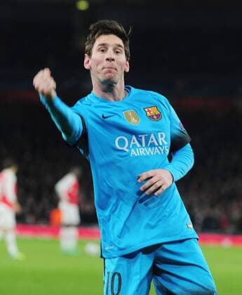 Football - 2015 2016 Champions League - Round of 16, First Leg: Arsenal vs. Barcelona Lionel Messi of Barcelona celebrates scoring goal no 2 from the penalty spot at The Emirates. COLORSPORT ANDREW COWIE 