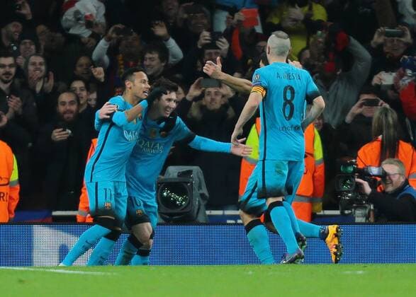 23.02.2016. Emirates Stadium, London, England. UEFA Champions League. Arsenal versus Barcelona. Barcelona Midfielder Lionel Messi celebrates as he makes it 2-0 from the penalty spot with his team mates IBL 