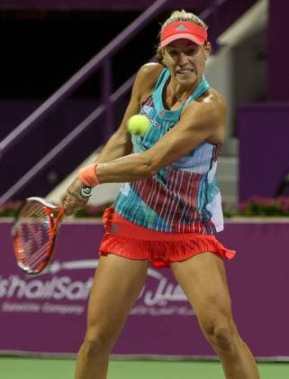 Angelique Kerber of Germany competes during the women s singles second round match against Zheng Saisai of China at the WTA Tennis Damen Qatar Open 2016 in Doha, Qatar, Feb. 23, 2016. Kerber lost 0-2. ) (SP)QATAR-DOHA-TENNIS-QATAR OPEN 2016-WOMEN S SINGLES Nikku 