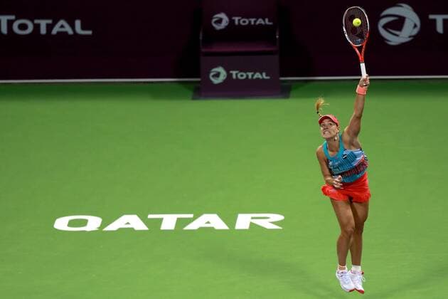 Angelique Kerber of Germany competes during the women s singles second round match against Zheng Saisai of China at the WTA Tennis Damen Qatar Open 2016 in Doha, Qatar, Feb. 23, 2016. Kerber lost 0-2. ) (SP)QATAR-DOHA-TENNIS-QATAR OPEN 2016-WOMEN S SINGLES Nikku 