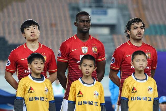 GUANGZHOU, CHINA - FEBRUARY 24: (CHINA OUT) Zheng Long 27, Jackson Martinez 9 and Ricardo Goulart 11 of Guangzhou Evergrande line up prior to the AFC Champions League Group H match between Guangzhou Evergrande and Pohang Steelers at Tianhe Center on February 24, 2016 in Guangzhou, China.  CFP480113396 