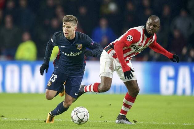 (L-R) Luciano Vietto of Club Atletico de Madrid, Gaston Pereiro of PSV during the UEFA Champions League Round of 16, First leg match between PSV Eindhoven and Atletico Madrid on February 24, 2016 at the Philips stadium in Eindhoven, The Netherlands. PSV v Atletico Madrid UEFA Champions League 2015 2016 xVIxxIVx 5036923