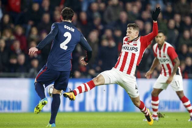 (L-R) Diego Godin of Club Atletico de Madrid, Santiago Arias of PSV during the UEFA Champions League Round of 16, First leg match between PSV Eindhoven and Atletico Madrid on February 24, 2016 at the Philips stadium in Eindhoven, The Netherlands. PSV v Atletico Madrid UEFA Champions League 2015 2016 xVIxxIVx 5037060