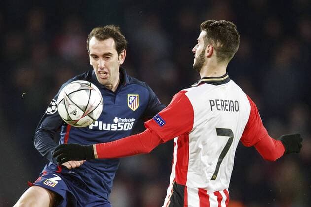 (L-R) Diego Godin of Club Atletico de Madrid, Gaston Pereiro of PSV during the UEFA Champions League Round of 16, First leg match between PSV Eindhoven and Atletico Madrid on February 24, 2016 at the Philips stadium in Eindhoven, The Netherlands. PSV v Atletico Madrid UEFA Champions League 2015 2016 xVIxxIVx 5037518