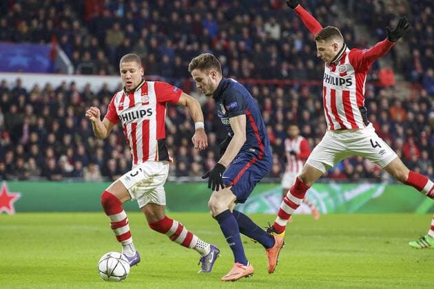 (L-R) Jeffrey Bruma of PSV, Saul Niguez of Club Atletico de Madrid, Santiago Arias of PSV during the UEFA Champions League Round of 16, First leg match between PSV Eindhoven and Atletico Madrid on February 24, 2016 at the Philips stadium in Eindhoven, The Netherlands. PSV v Atletico Madrid UEFA Champions League 2015 2016 xVIxxIVx 5037519