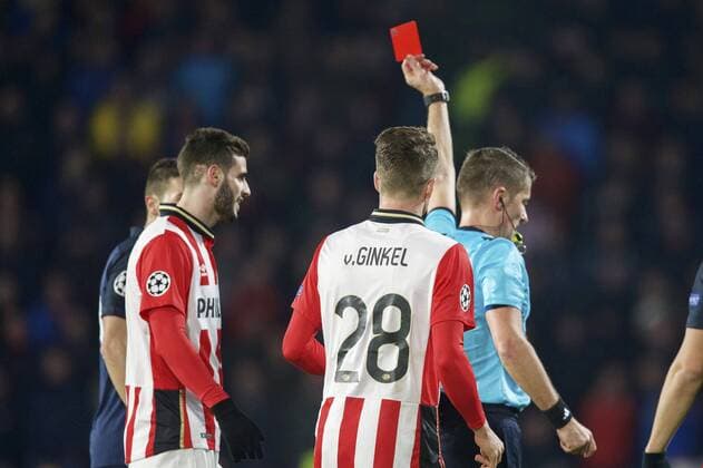 (L-R) Gaston Pereiro of PSV, Marco van Ginkel of PSV, referee Daniele Orsato during the UEFA Champions League Round of 16, First leg match between PSV Eindhoven and Atletico Madrid on February 24, 2016 at the Philips stadium in Eindhoven, The Netherlands. PSV v Atletico Madrid UEFA Champions League 2015 2016 xVIxxIVx 5037521