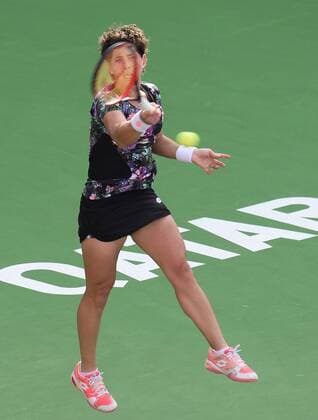 (160225) -- DOHA, Feb. 25, 2016 -- Carla Suarez Navarro of Spain competes during the singles third round match against Timea Bacsinszky of Switzerland at the WTA Tennis Damen Qatar Open 2016 in Doha, Qatar, Feb. 24, 2016. Carla Suarez Navarro won 2-0. ) (SP)QATAR-DOHA-TENNIS-WTA QATAR OPEN 2016 Nikku 