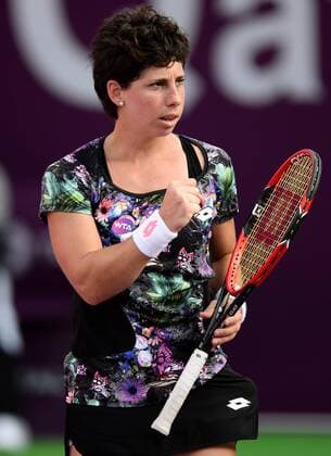 (160225) -- DOHA, Feb. 25, 2016 -- Carla Suarez Navarro of Spain celebrates after scoring during the singles third round match against Timea Bacsinszky of Switzerland at the WTA Tennis Damen Qatar Open 2016 in Doha, Qatar, Feb. 24, 2016. Carla Suarez Navarro won 2-0. ) (SP)QATAR-DOHA-TENNIS-WTA QATAR OPEN 2016 Nikku 