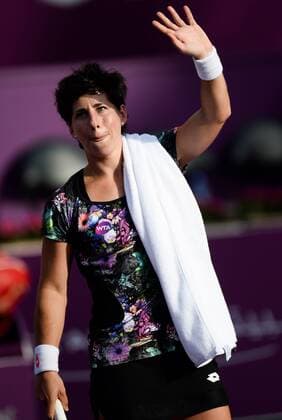 (160225) -- DOHA, Feb. 25, 2016 -- Carla Suarez Navarro of Spain greets the spectators after the singles third round match against Timea Bacsinszky of Switzerland at the WTA Tennis Damen Qatar Open 2016 in Doha, Qatar, Feb. 24, 2016. Carla Suarez Navarro won 2-0. ) (SP)QATAR-DOHA-TENNIS-WTA QATAR OPEN 2016 Nikku 