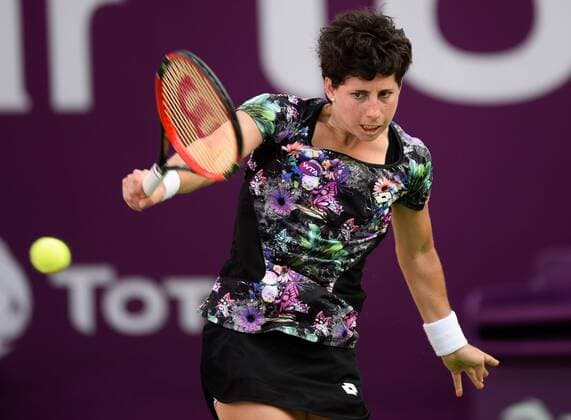 (160225) -- DOHA, Feb. 25, 2016 -- Carla Suarez Navarro of Spain competes during the singles third round match against Timea Bacsinszky of Switzerland at the WTA Tennis Damen Qatar Open 2016 in Doha, Qatar, Feb. 24, 2016. Carla Suarez Navarro won 2-0. ) (SP)QATAR-DOHA-TENNIS-WTA QATAR OPEN 2016 Nikku 