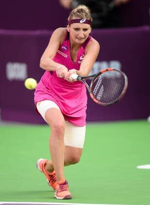 (160225) -- DOHA, Feb. 25, 2016 -- Timea Bacsinszky of Switzerland competes during the singles third round match against Carla Suarez Navarro of Spain at the WTA Tennis Damen Qatar Open 2016 in Doha, Qatar, Feb. 24, 2016. Carla Suarez Navarro won 2-0. ) (SP)QATAR-DOHA-TENNIS-WTA QATAR OPEN 2016 Nikku 