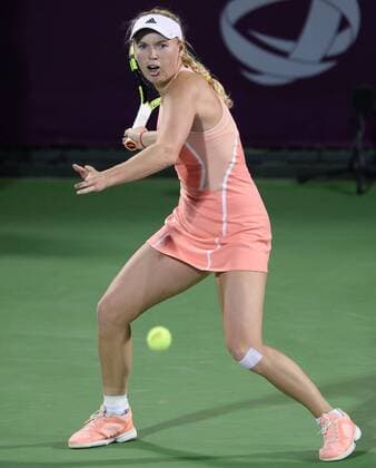 (160225) -- DOHA, Feb. 25, 2016 -- Caroline Wozniacki of Denmark competes during the singles third round match against Elena Vesnina of Russia at the WTA Tennis Damen Qatar Open 2016 in Doha, Qatar, Feb. 24, 2016. Elena Vesnina won 2-1. ) (SP)QATAR-DOHA-TENNIS-WTA QATAR OPEN 2016 Nikku 