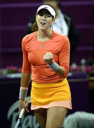(160225) -- DOHA, Feb. 25, 2016 -- Garbine Muguruza of Spain celebrates after scoring during the singles third round match against Timea Babos of Hungary at the WTA Tennis Damen Qatar Open 2016 in Doha, Qatar, Feb. 24, 2016. Garbine Muguruza won 2-0. ) (SP)QATAR-DOHA-TENNIS-WTA QATAR OPEN 2016 Nikku 