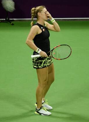 (160225) -- DOHA, Feb. 25, 2016 -- Timea Babos of Hungary reacts during the singles third round match against Garbine Muguruza of Spain at the WTA Tennis Damen Qatar Open 2016 in Doha, Qatar, Feb. 24, 2016. Garbine Muguruza won 2-0. ) (SP)QATAR-DOHA-TENNIS-WTA QATAR OPEN 2016 Nikku 