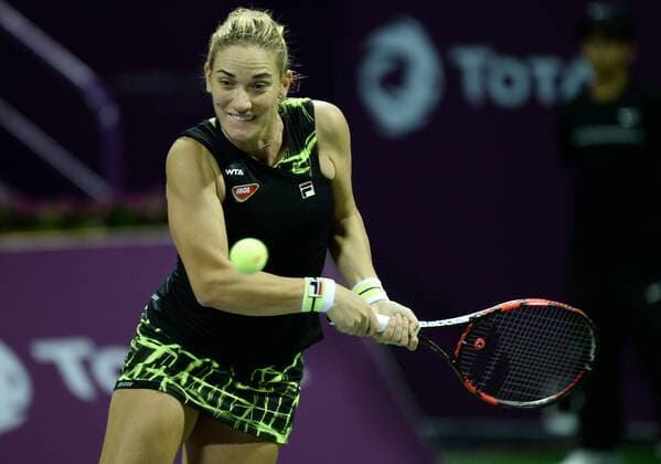(160225) -- DOHA, Feb. 25, 2016 -- Timea Babos of Hungary competes during the singles third round match against Garbine Muguruza of Spain at the WTA Tennis Damen Qatar Open 2016 in Doha, Qatar, Feb. 24, 2016. Garbine Muguruza won 2-0. ) (SP)QATAR-DOHA-TENNIS-WTA QATAR OPEN 2016 Nikku 