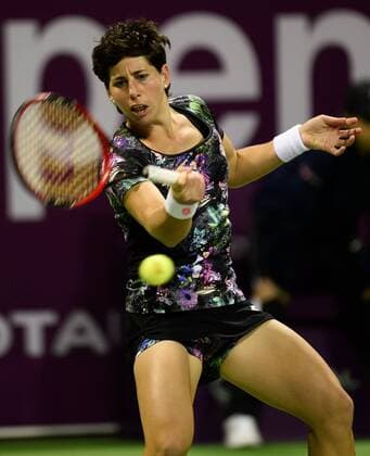 DOHA, Feb. 25, 2016 -- Carla Suarez Navarro of Spain competes during the women s singles quarterfinal match against Elena Vesnina of Russia at the WTA Tennis Damen Qatar Open 2016 in Doha, Qatar, Feb. 25, 2016. Carla Suarez Navarro won 2-0. ) (SP)QATAR-DOHA-TENNIS-WTA QATAR OPEN 2016 Nikku 