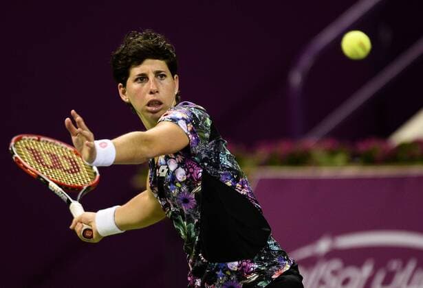 DOHA, Feb. 25, 2016 -- Carla Suarez Navarro of Spain competes during the women s singles quarterfinal match against Elena Vesnina of Russia at the WTA Tennis Damen Qatar Open 2016 in Doha, Qatar, Feb. 25, 2016. Carla Suarez Navarro won 2-0. ) (SP)QATAR-DOHA-TENNIS-WTA QATAR OPEN 2016 Nikku 