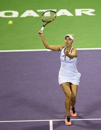 DOHA, Feb. 25, 2016 -- Elena Vesnina of Russia competes during the women s singles quarterfinal match against Carla Suarez Navarro of Spain at the WTA Tennis Damen Qatar Open 2016 in Doha, Qatar, Feb. 25, 2016. Carla Suarez Navarro won 2-0. ) (SP)QATAR-DOHA-TENNIS-WTA QATAR OPEN 2016 Nikku 