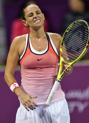 DOHA, Feb. 25, 2016 -- Roberta Vinci of Italy reacts during the women s singles quarterfinal match against Agnieszka Radwanska of Poland at the WTA Tennis Damen Qatar Open 2016 in Doha, Qatar, Feb. 25, 2016. Agnieszka Radwanska won 2-1. ) (SP)QATAR-DOHA-TENNIS-WTA QATAR OPEN 2016 Nikku 