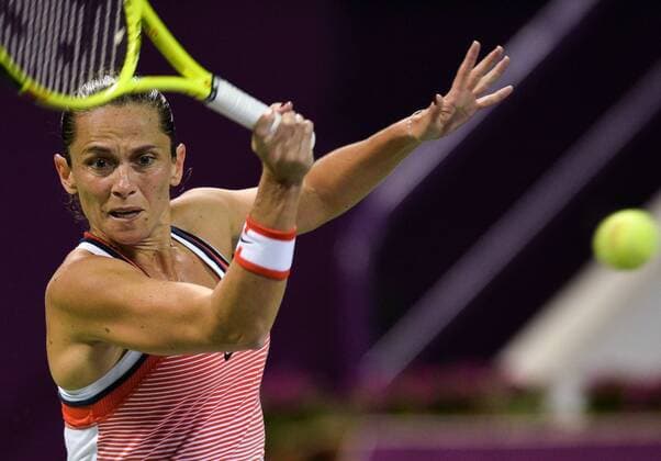 DOHA, Feb. 25, 2016 -- Roberta Vinci of Italy competes during the women s singles quarterfinal match against Agnieszka Radwanska of Poland at the WTA Tennis Damen Qatar Open 2016 in Doha, Qatar, Feb. 25, 2016. Agnieszka Radwanska won 2-1. ) (SP)QATAR-DOHA-TENNIS-WTA QATAR OPEN 2016 Nikku 