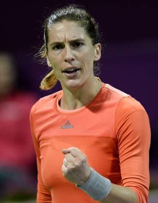 DOHA, Feb. 25, 2016 -- Andrea Petkovic of Germany reacts during the women s singles quarterfinal match against Garbine Muguruza of Spain at the WTA Tennis Damen Qatar Open 2016 in Doha, Qatar, Feb. 25, 2016. Andrea Petkovic won 2-1. ) (SP)QATAR-DOHA-TENNIS-WTA QATAR OPEN 2016 Nikku 