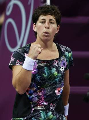 (160227) -- DOHA, Feb. 26, 2016 -- Carla Suarez Navarro of Spain celebrates during the women s singles semi-final match against Agnieszka Radwanska of Poland at the WTA Tennis Damen Qatar Total Open 2016 in Doha, Qatar Feb. 26, 2016. Carla Suraez Navarro won 2-0. ) (SP)QATAR-DOHA-TENNIS-WTA QATAR OPEN 2016 Nikku 