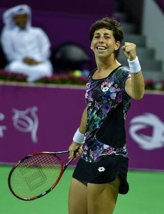 Carla Suarez Navarro of Spain celebrates after winning the women s singles final against Jelena Ostapenko of Latvia at the WTA Tennis Damen Qatar Total Open 2016 at the International Khalifa Tennis Complex in Doha, Qatar February 27, 2016. Carla Suarez Navarro won 2-1 and claimed the title. ) (SP)QATAR-DOHA-TENNIS-WTA QATAR OPEN 2016 Nikku 