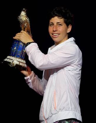 Carla Suarez Navarro of Spain poses with winner s trophy during the awarding ceremony for women s singles at the WTA Tennis Damen Qatar Total Open 2016 at the International Khalifa Tennis Complex Doha, Qatar February 27, 2016. Carla Suarez Navarro won 2-1 and claimed the title. ) (SP)QATAR-DOHA-TENNIS-WTA QATAR OPEN 2016 Nikku 