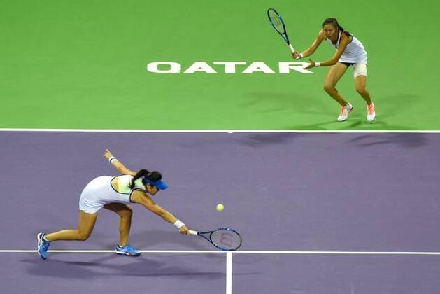Hao-Ching Chan (R) of Chinese Taipei and Yung-Jan Chan Chinese Taipei compete during the final match of women s doubles against Sara Errani of Italy and Carla Suarez Navarro of Spain at the WTA Tennis Damen Qatar Total Open 2016 at the International Khalifa Tennis Complex Doha, Qatar February 27, 2016. Hao-Ching Chan and Yung-Jan Chan won 2-0 and claimed the title. ) (SP)QATAR-DOHA-TENNIS-WTA QATAR OPEN 2016 Nikku 