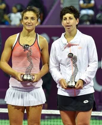 Sara Errani (L) of Italy and Carla Suarez Navarro of Spain pose at the awarding ceremony after the double s final match of WTA Tennis Damen Qatar Total Open 2016 against Hao-Ching Chan of Chinese Taipei and Yung-Jan Chan of Chinese Taipei at the WTA Qatar Total Open 2016 at the International Khalifa Tennis Complex Doha, Qatar February 27, 2016. Hao-Ching Chan and Yung-Jan Chan won 2-0 and claimed the title. ) (SP)QATAR-DOHA-TENNIS-WTA QATAR OPEN 2016 Nikku 