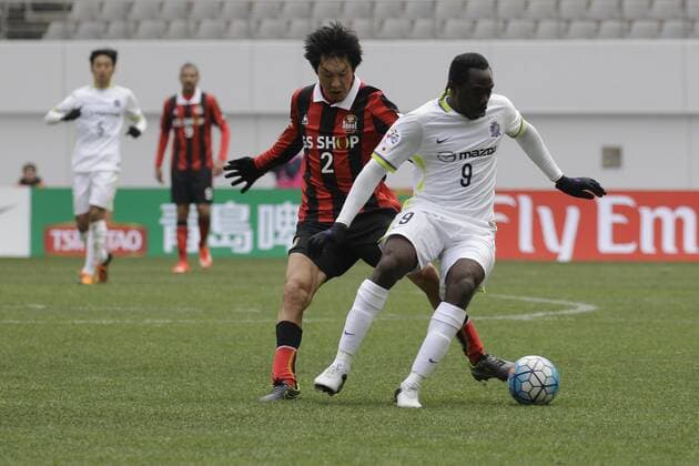 March 1, 2016 - Seoul, South Korea - Takahagi Yojiro of FC Seoul and Maduabuchi Peter Utaka of Sanfrecce Hiroshima action during an ACL FC Seoul v Sanfrecce Hiroshima match at Seoul World Cup Stadium in South Korea. Match won the FC Seoul, Score 4-1. ACL-FC Seoul v Sanfrecce Hiroshima-Seoul - ZUMAs168