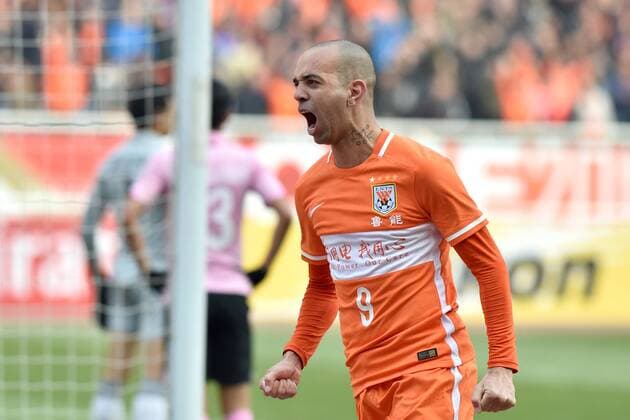 (160301) -- JINAN, March 1, 2016 -- Diego Tardelli of China s Shandong Luneng FC celebrates for goal during the group F match against Thailand s Buriram United at the AFC Champions League 2016 in Ji nan, east China s Shandong Province, on March 1, 2016. Shandong Luneng FC won 3-0. ) (lm) (SP)CHINA-JINAN-FOOTBALL-AFC CHAMPIONS LEAGUE (CN) XuxSuhui 