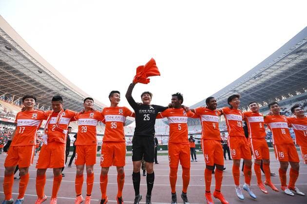 JINAN, CHINA - MARCH 01: (CHINA OUT) of Shandong Luneng players celebrate after the AFC Champions League Group F match between Shandong Luneng and Buriram United at Jinan Olympic Sports Centre on March 1, 2016 in Jinan, China.  CFP480460242 