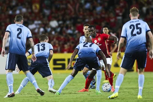 SYDNEY, AUSTRALIA - MARCH 02: (CHINA OUT) Jackson Martinez 9 of Guangzhou Evergrande is challenged by Sydney FC players during the AFC Champions League Group H match between Sydney FC and Guangzhou Evergrande at Allianz Stadium on March 2, 2016 in Sydney, Australia.  CFP39480505960 