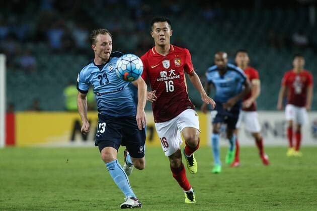 SYDNEY, AUSTRALIA - MARCH 02: (CHINA OUT) Huang Bowen 16 of Guangzhou Evergrande and Rhyan Bert Grant 23 of Sydney FC compete for the ball during the AFC Champions League Group H match between Sydney FC and Guangzhou Evergrande at Allianz Stadium on March 2, 2016 in Sydney, Australia.  CFP55480509134 