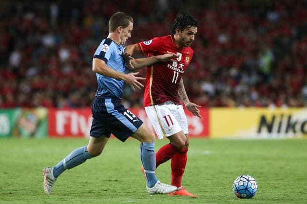 SYDNEY, AUSTRALIA - MARCH 02: (CHINA OUT) Ricardo Goulart 11 of Guangzhou Evergrande and Brandon O Neill 13 of Sydney FC compete for the ball during the AFC Champions League Group H match between Sydney FC and Guangzhou Evergrande at Allianz Stadium on March 2, 2016 in Sydney, Australia.  CFP57480509136 