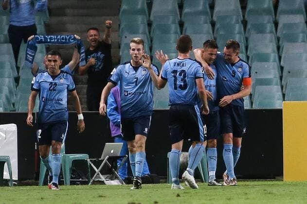 SYDNEY, AUSTRALIA - MARCH 02: (CHINA OUT) Milos Dimitrijevic 8 of Sydney FC celebrates with team mates after scoring his team s second goal during the AFC Champions League Group H match between Sydney FC and Guangzhou Evergrande at Allianz Stadium on March 2, 2016 in Sydney, Australia.  CFP59480509850 