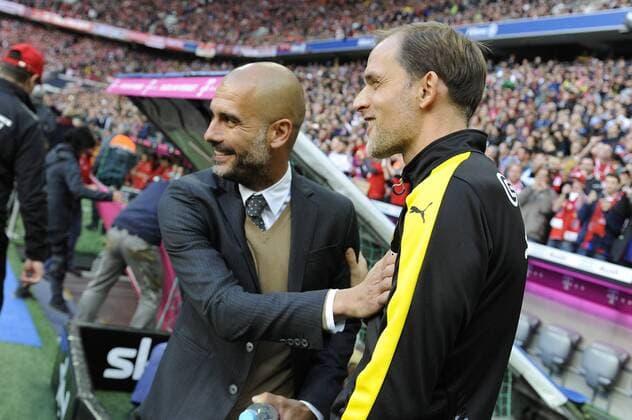 Vorschau zum Bundesligakracher Borussia Dortmund-FC Bayern Muenchen.Archivbild: v.li:Pep (Josep) GUARDIOLA (Trainer FCB),Thomas TUCHEL (Trainer Borussia Dortmund),Begruessung,Shake hands. Fussball 1. Bundesliga, 8. Spieltag,FC Bayern Muenchen (M)-Borussia Dortmund (DO) 5-1, am 04.10.2015 in Muenchen Deutschland.A L L I A N Z A R E NA ,