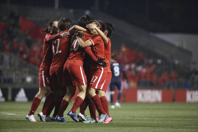 OSAKA, JAPAN - MARCH 04: (CHINA OUT) Zhang Rui 20 of China celebrates with team mates after scoring her team s first goal during the AFC Women s Olympic Final Qualification Round match between Japan and China at Kincho Stadium on March 4, 2016 in Osaka, Japan.  CFP480616954 