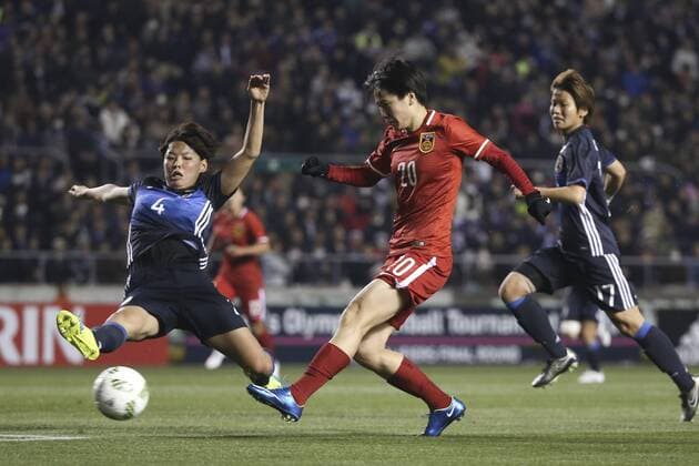 OSAKA, JAPAN - MARCH 04: (CHINA OUT) Zhang Rui 20 of China scores her team s first goal during the AFC Women s Olympic Final Qualification Round match between Japan and China at Kincho Stadium on March 4, 2016 in Osaka, Japan.  CFP480616955 