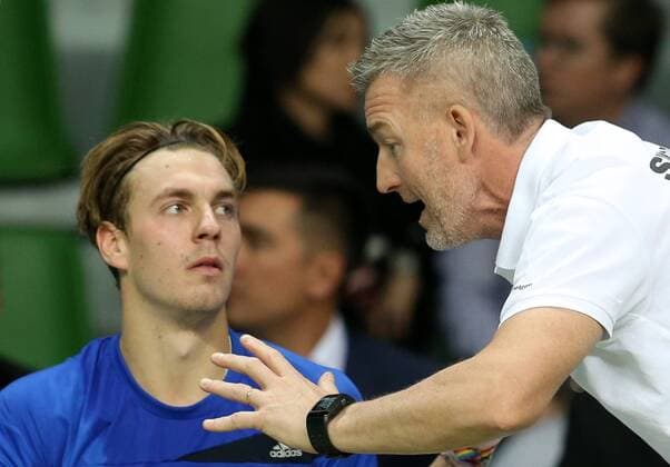 KAZAN, RUSSIA. MARCH 4, 2016. Sweden s Isak Arvidsson (L) listens to coach Fredrik Rosengren in their Davis Cup Group I Europe Africa Zone 1st Round tennis match at Kazan Tennis Academy. Russia won 6-3, 6-1, 6-1. Yegor Aleyev TASS  TS018933